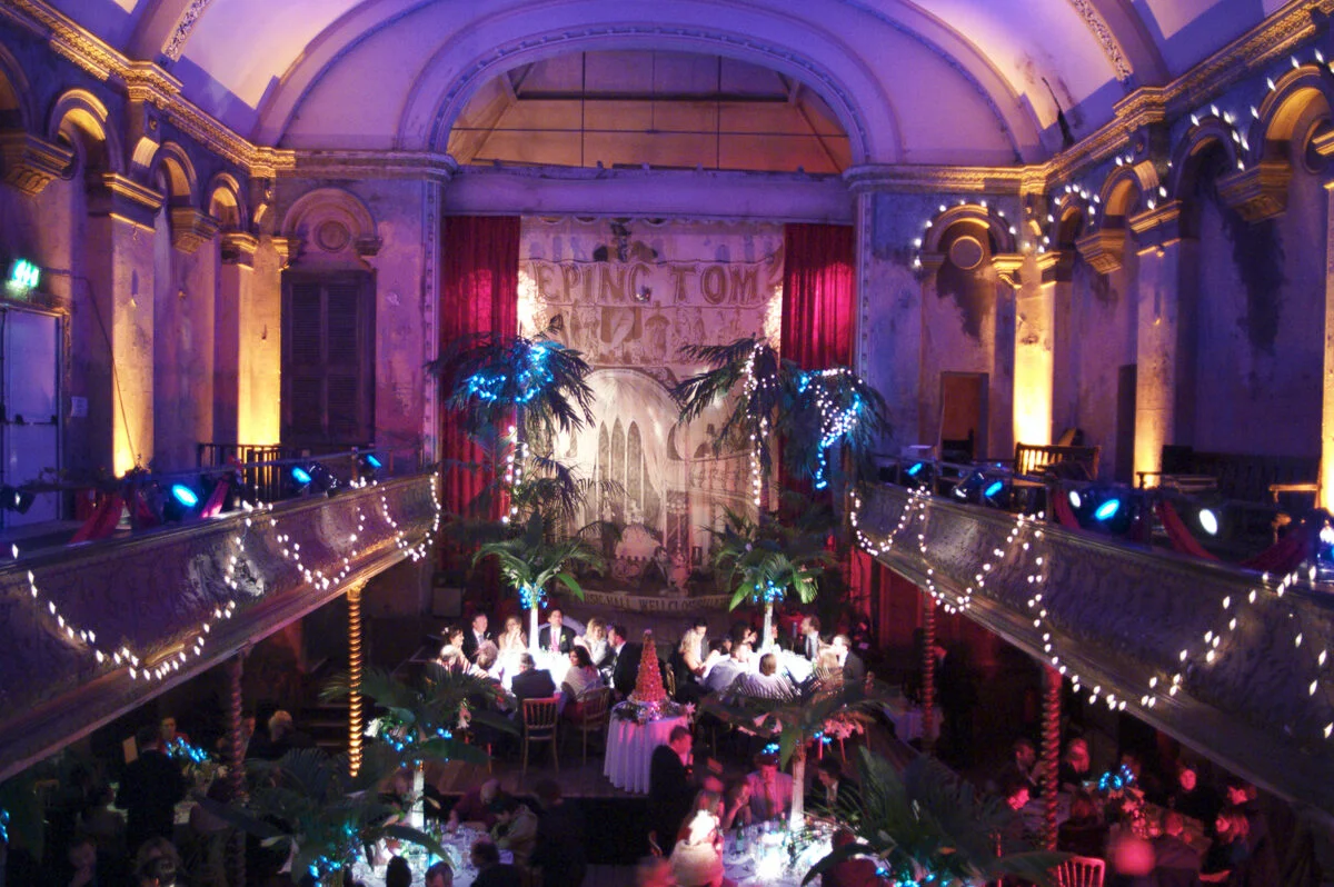 A large room with a lot of people in it.