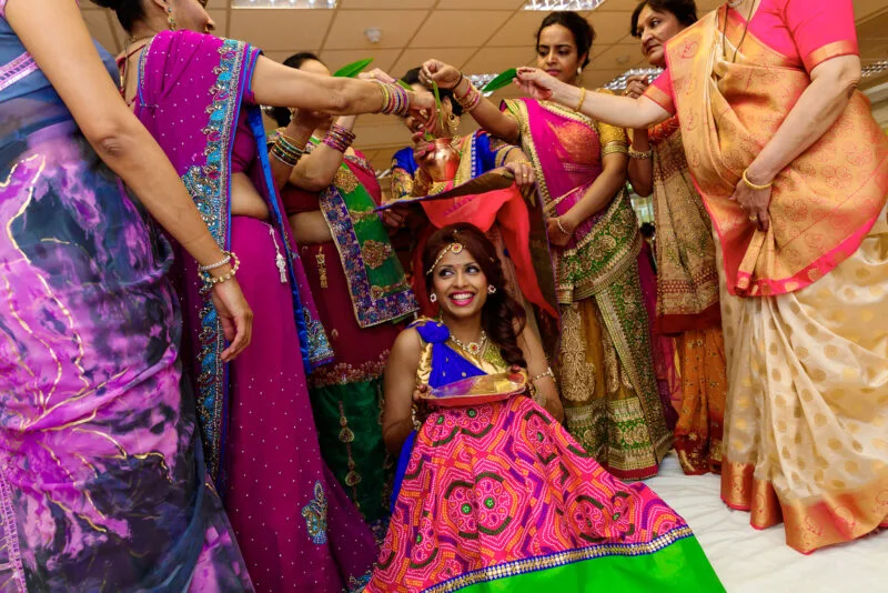 A group of women in colorful saris.