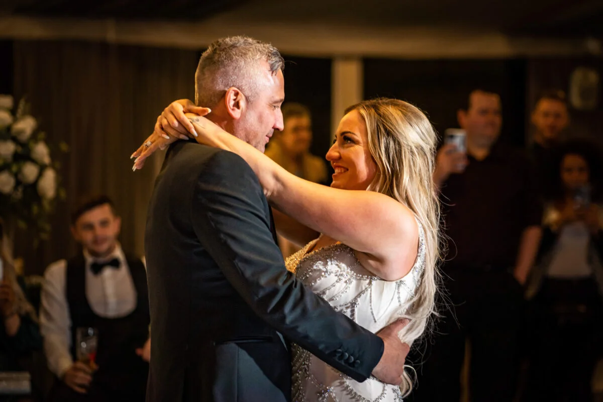 Best wedding photographer capturing a bride and groom's first dance at their reception in Bristol.