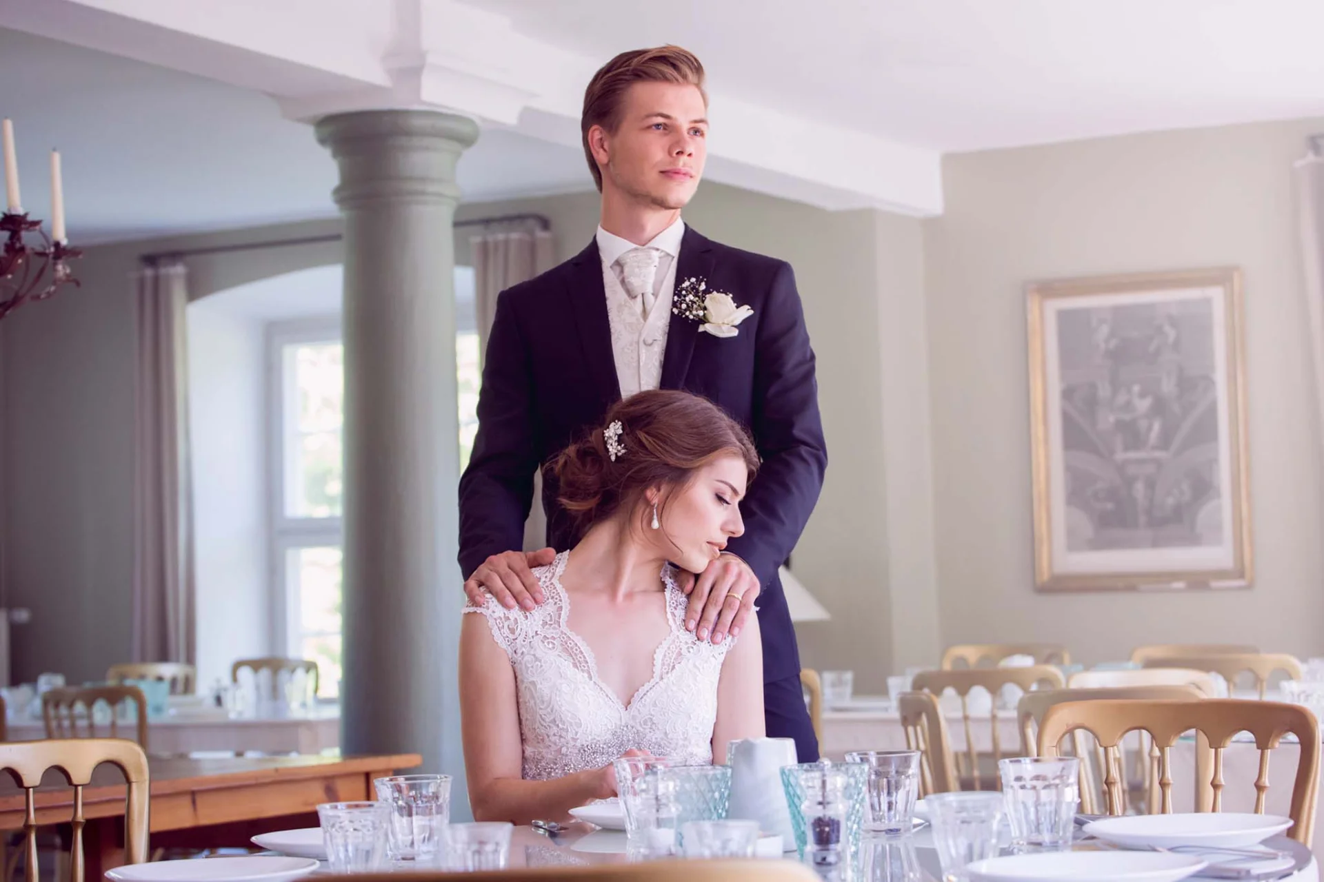 A fairytale wedding with a bride and groom at their table. (listing)