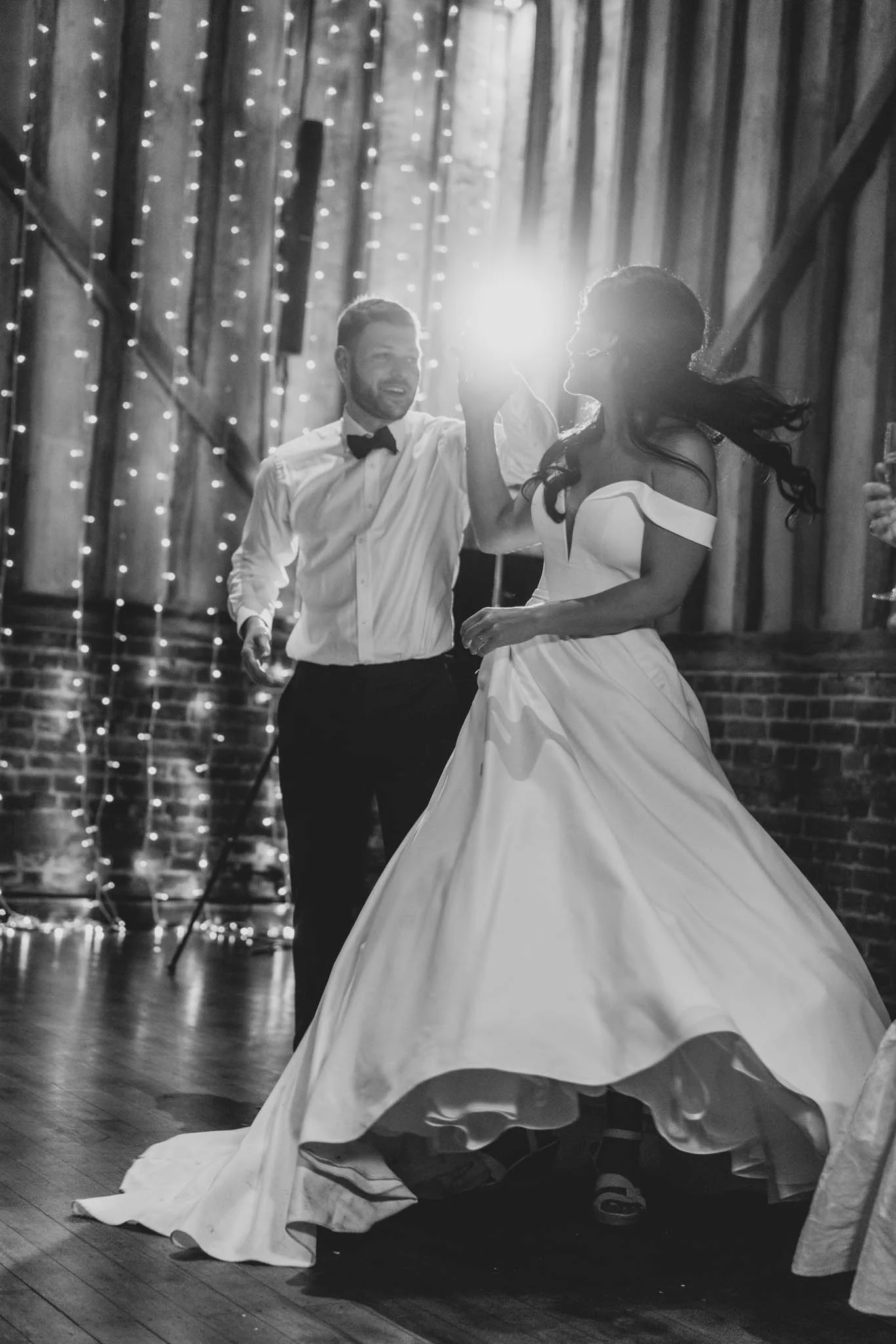 A fairytale bride and groom dancing at their wedding reception. (listing)