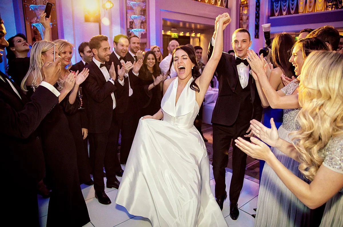 Bride-and-groom-entrance-at-Sheraton-Grand-wedding-London (listing)