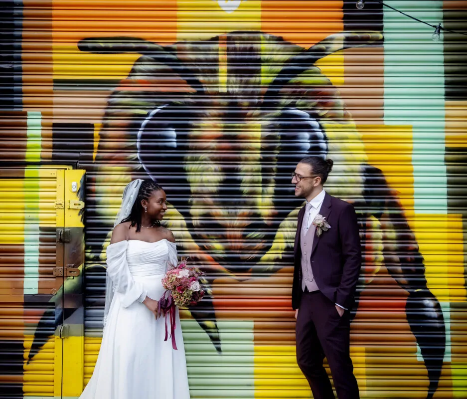 Old-Timber-Store-wedding-couple-by-roller-doors-London