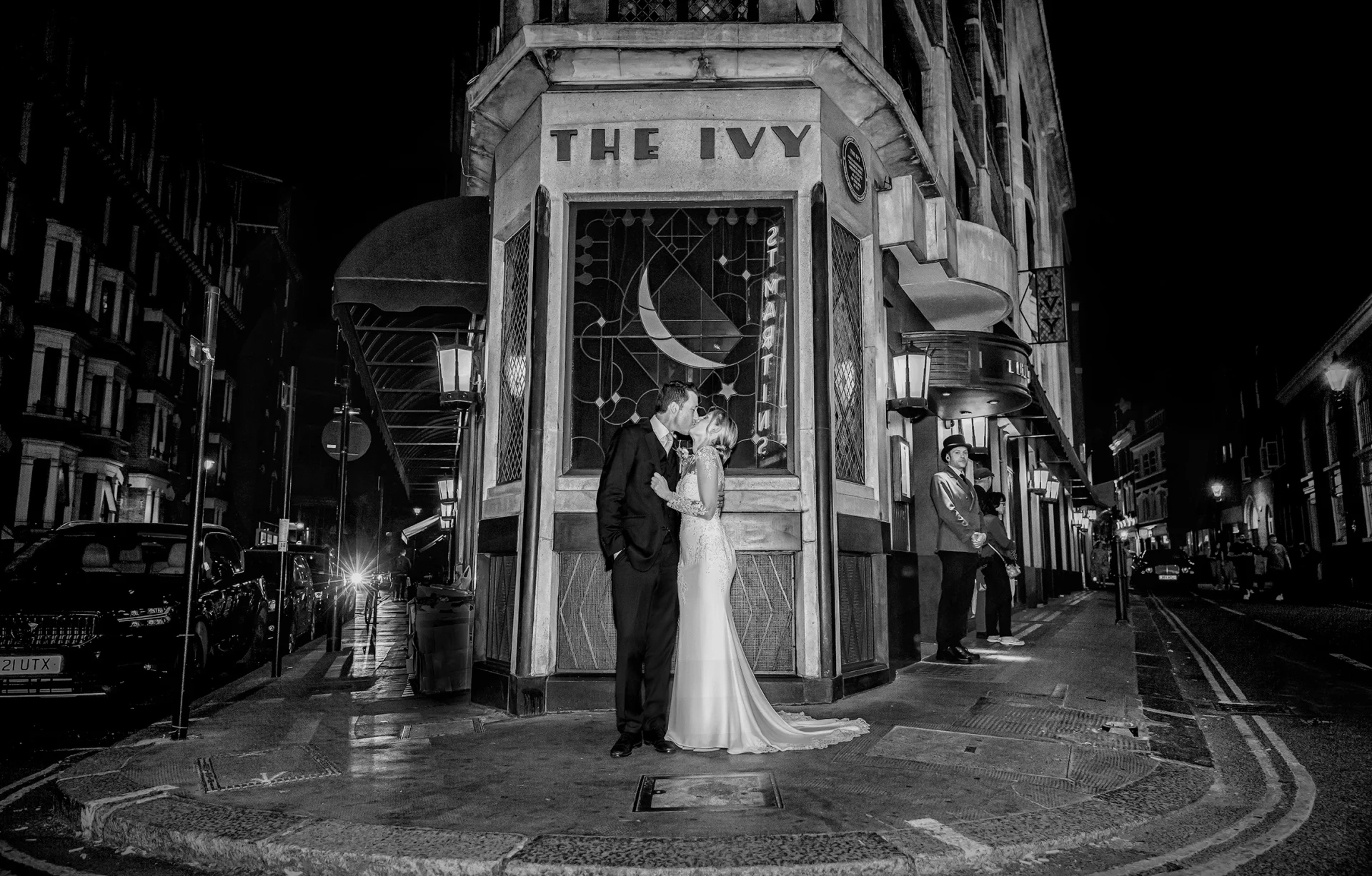 Wedding-couple-kiss-outside-The-Ivy-central-London-image (listing)