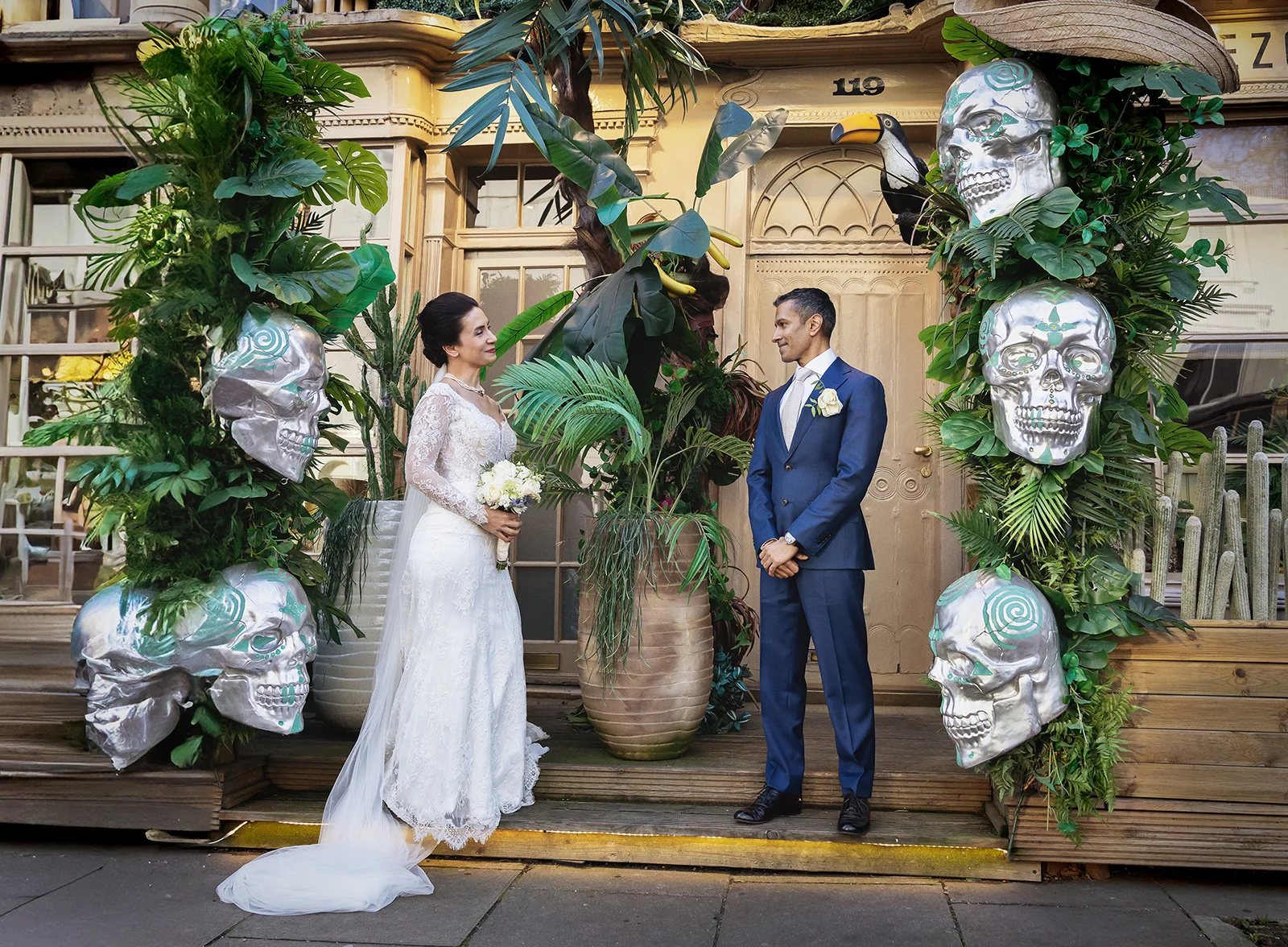 Bride-and-groom-by-skulls-Chelsea-Old-Town-Weddin-Wedissimo (listing)