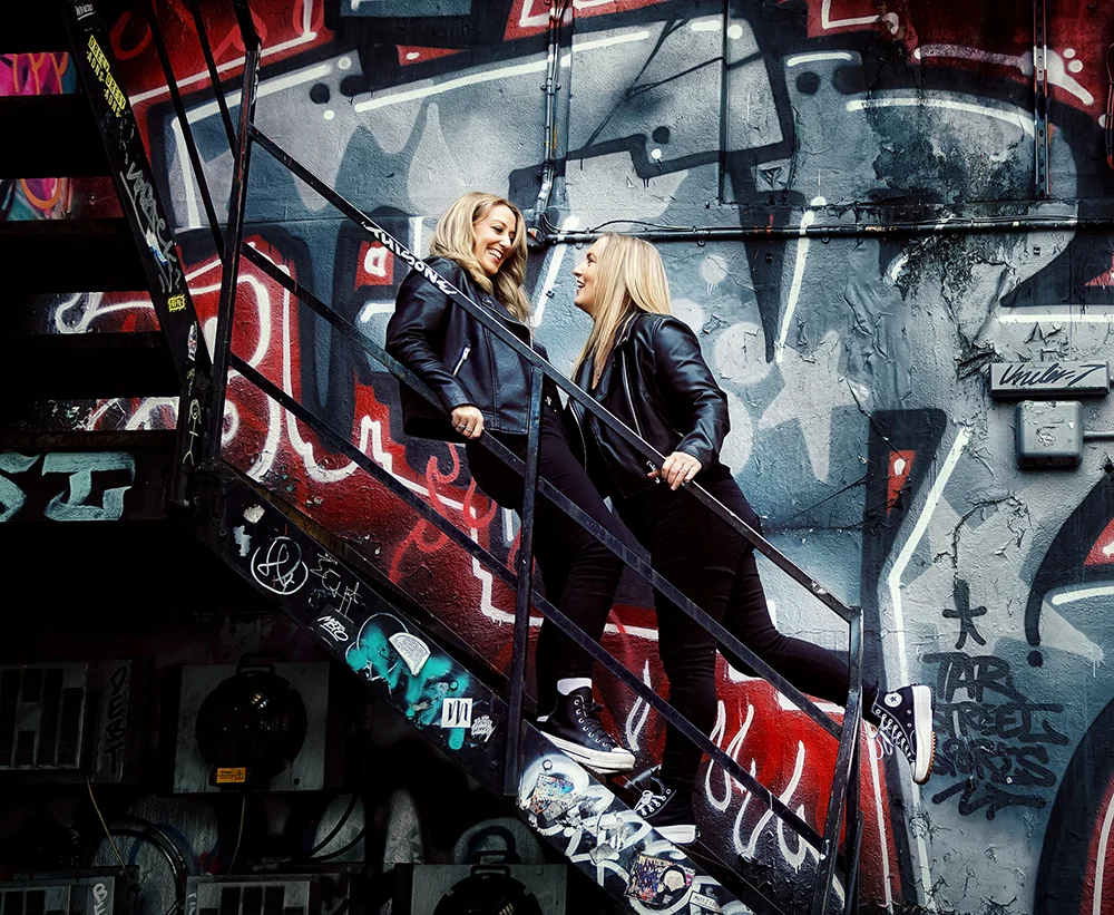 Shoreditch-engagement-couple-on-steps-and-graffiti-Wedissimo (listing)