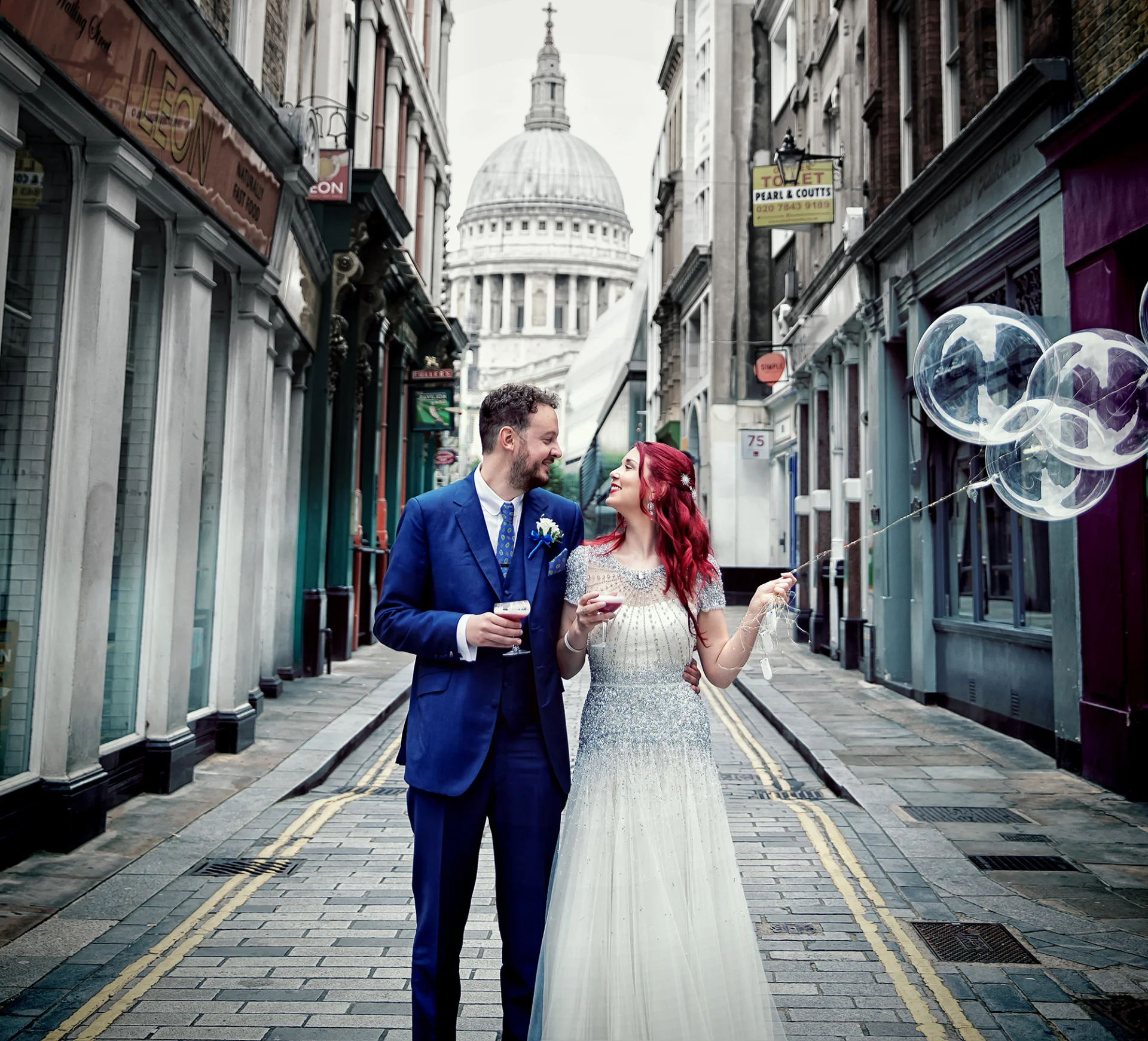 Islington-wedding-couple-with-balloons-by-St-Pauls-Cathedral-image (listing)