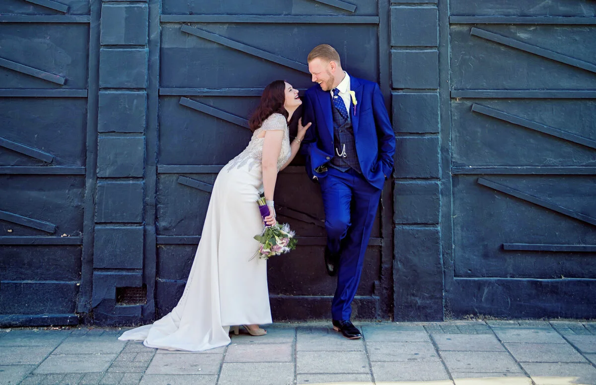 London-wedding-photographer-Upper-Street-laughter-couple-image-2023-banner