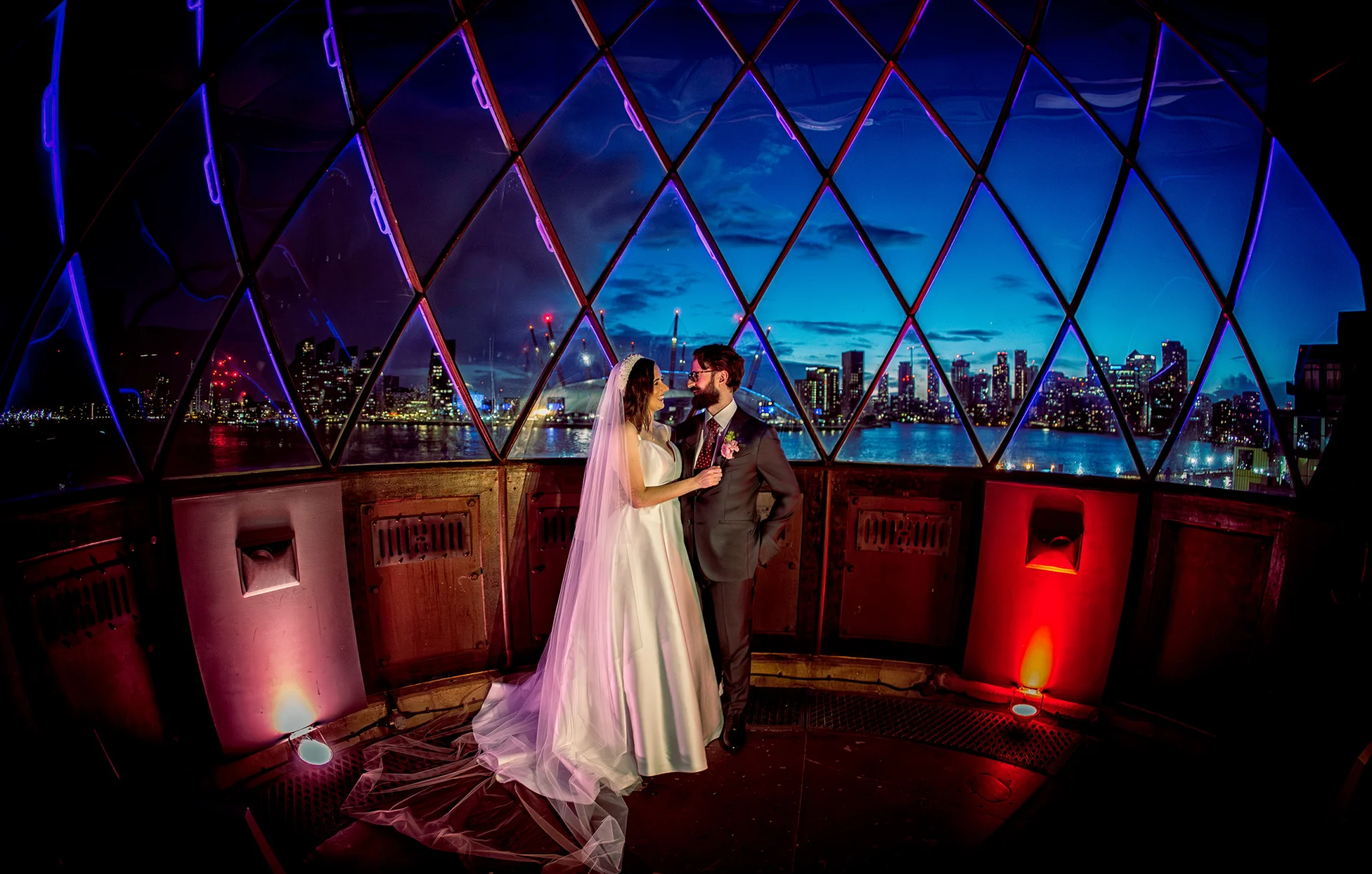 Trinity-Buoy-Wharf-wedding-couple-in-lighthouse-at-night (listing)