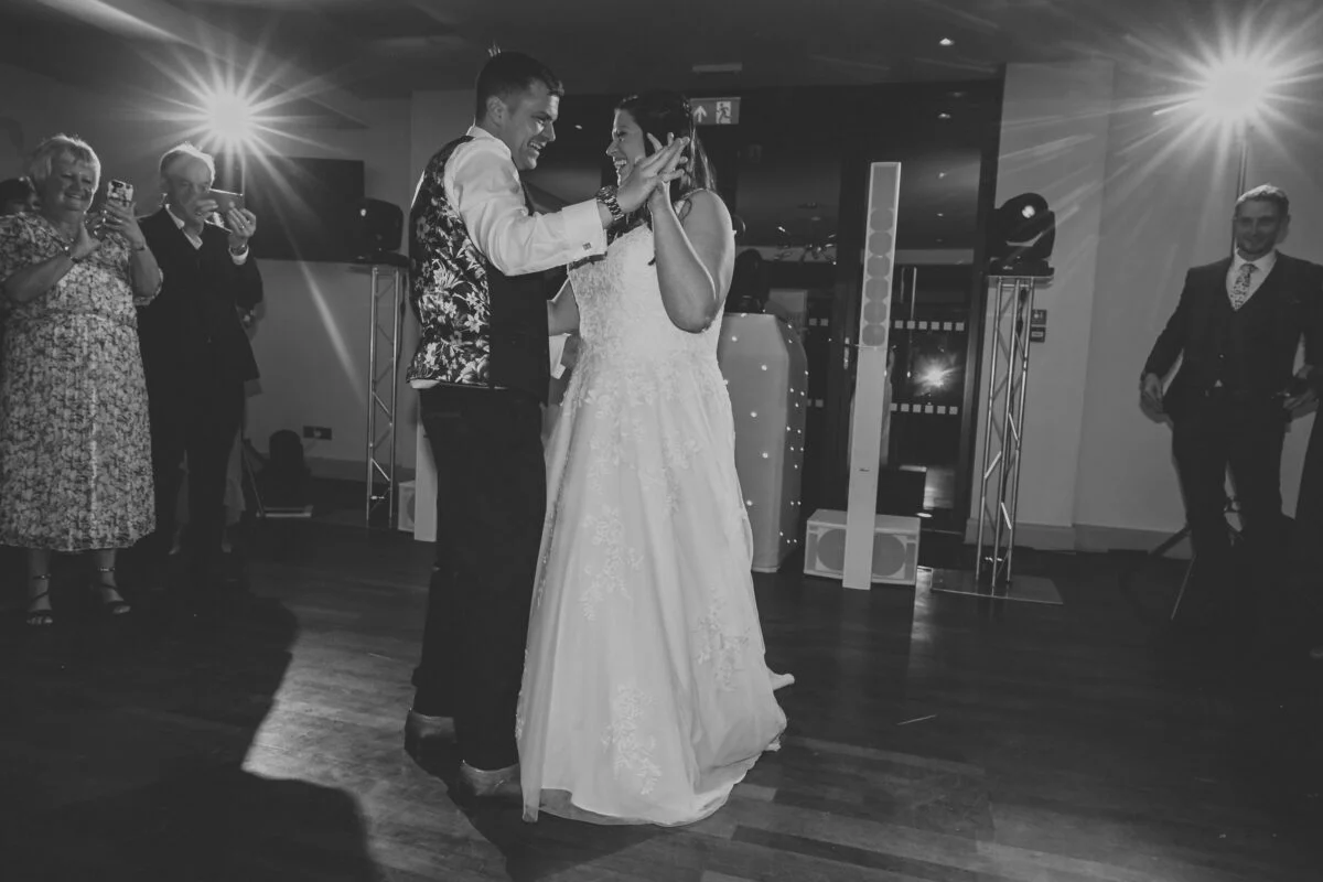 A bride and groom sharing their first dance.