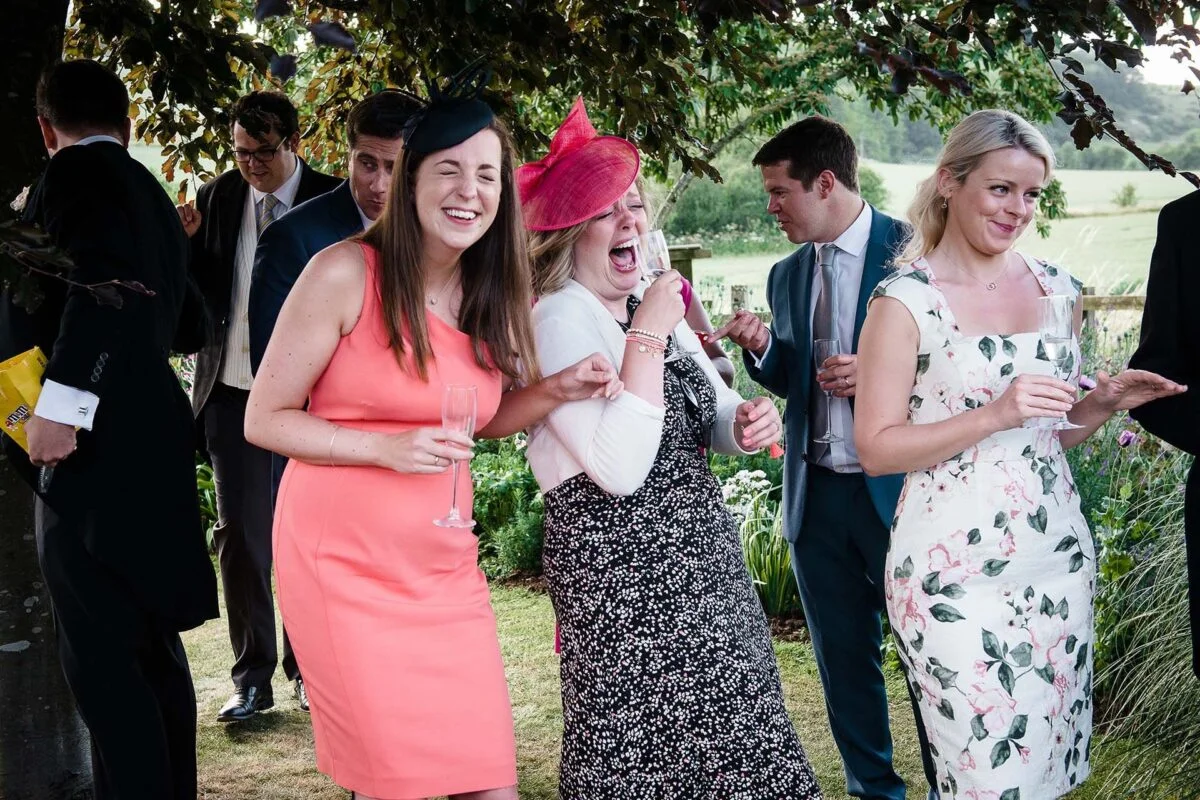 laughing_guests_at-drinks_reception-2x-ae320b35
