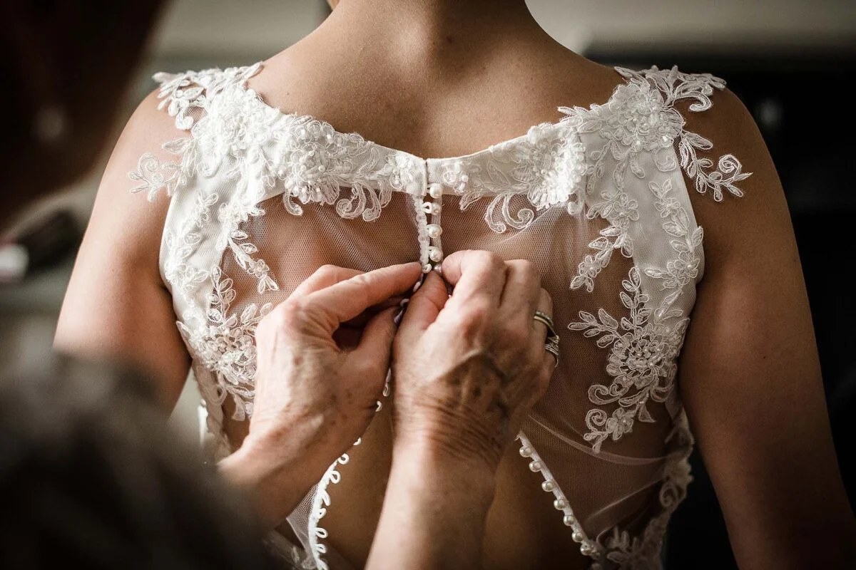 mother_of_bride_fastening_dress-2x-b35dd764