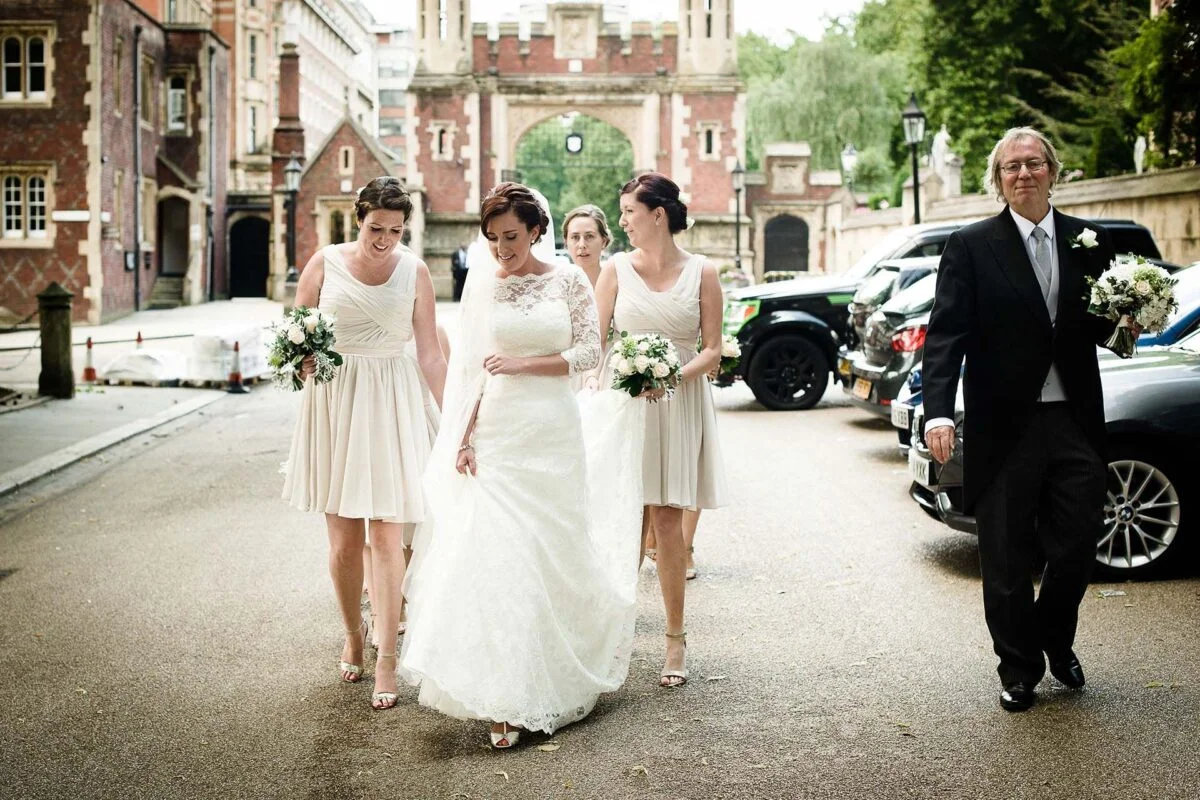 bridal_party_walking_to_church-2x-778b60aa
