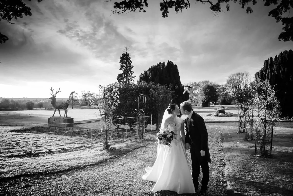 A black and white photo of a bride and groom.
