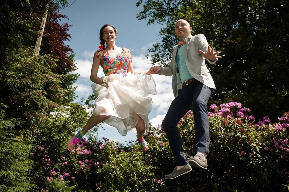 bride_groom_on_trampoline-2x-c519f12c