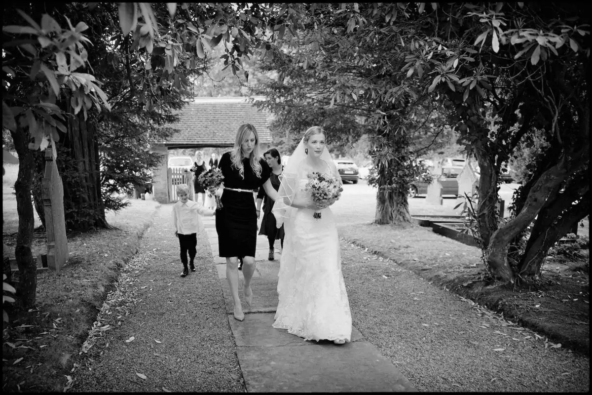 bride_walking_to_Church-2x-a66469af