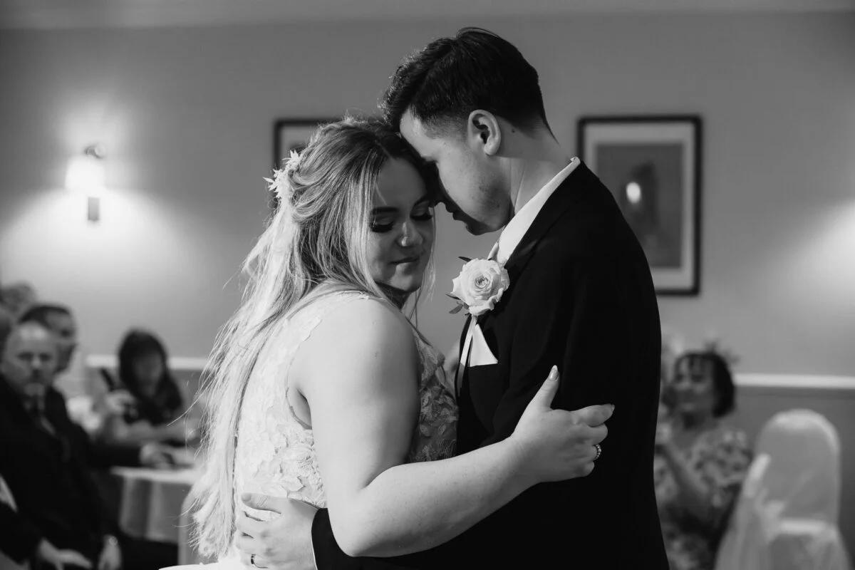 A bride and groom sharing their first dance.