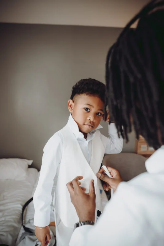 A little boy getting ready for his wedding.