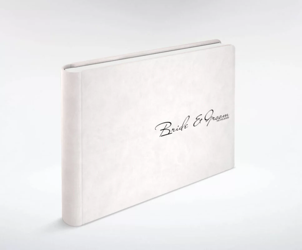 A white book with black writing on it.