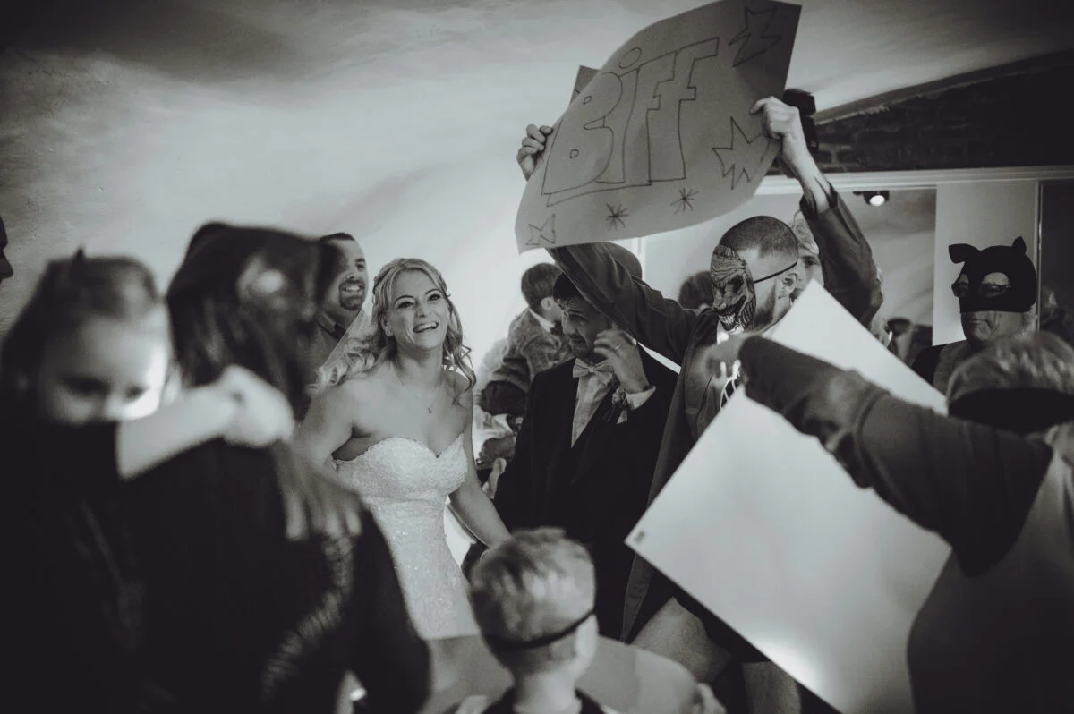 A black and white photo of a group of people holding signs.