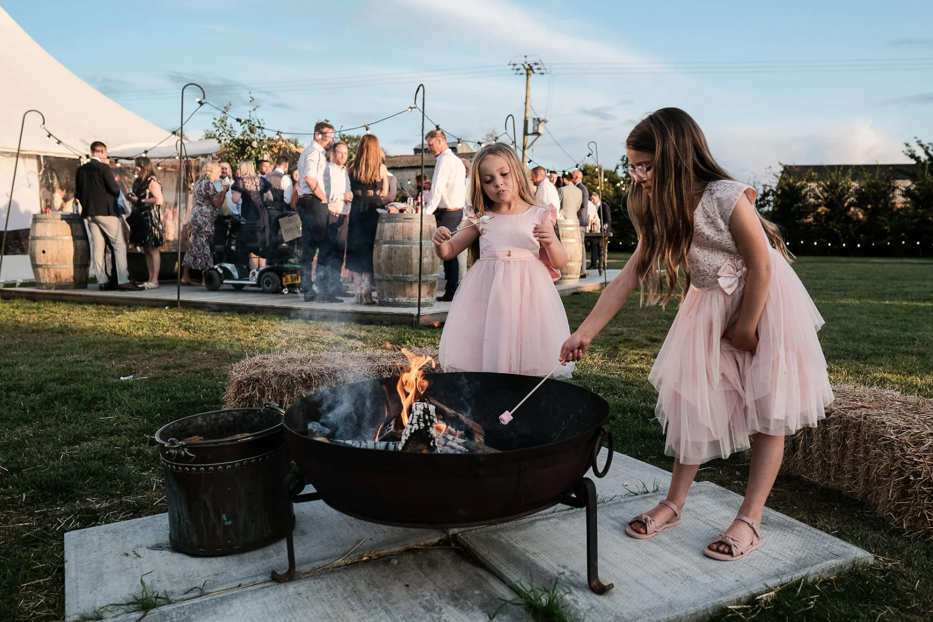 toasting-marshmallows-willow-grange-farm-chittering-wedding (listing)