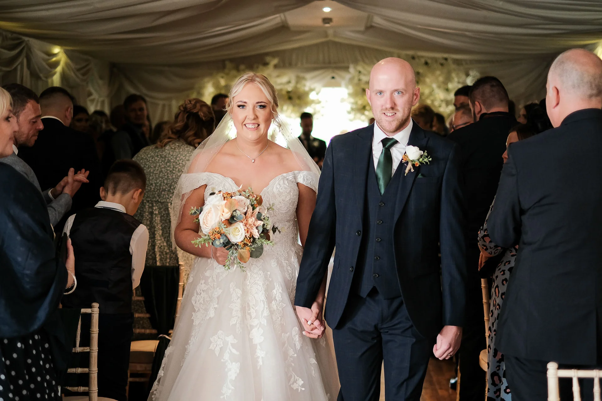 bride-groom-walking-down-aisle-poachers-hotel-boston-wedding (listing)