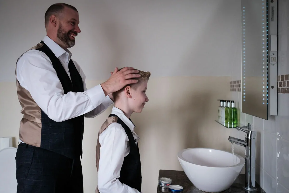 groom-son-getting-ready-oundle-talbot-wedding