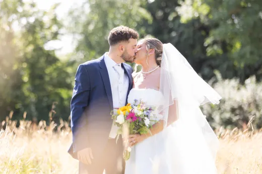 4 Bride and Groom kiss