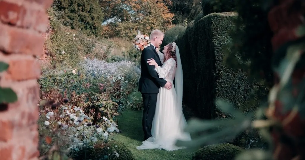 Couple through archway