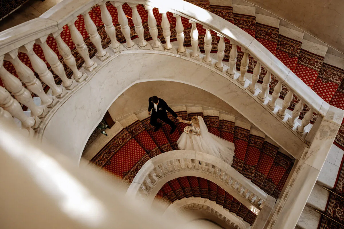 Bride Ascending Elegant Staircase