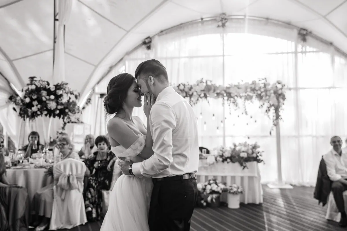 Bride and Groom Embracing at Wedding Reception
