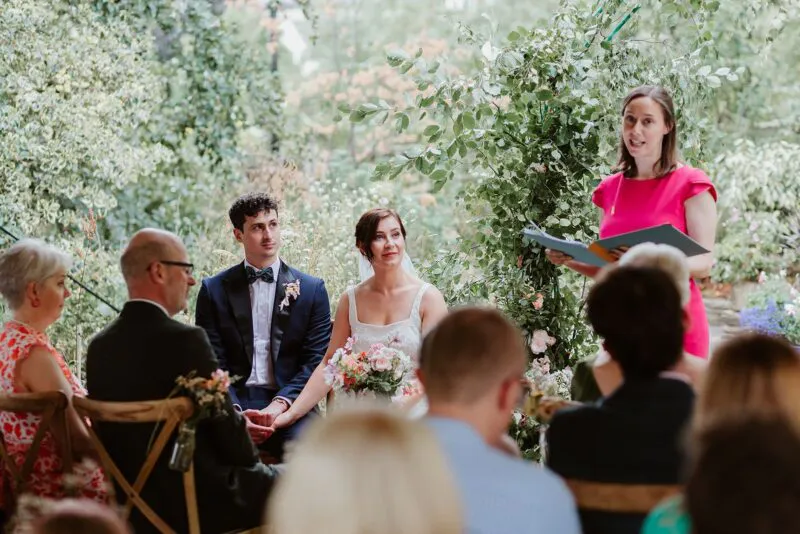 Couple-listening-to-wedding-celebrant (listing)