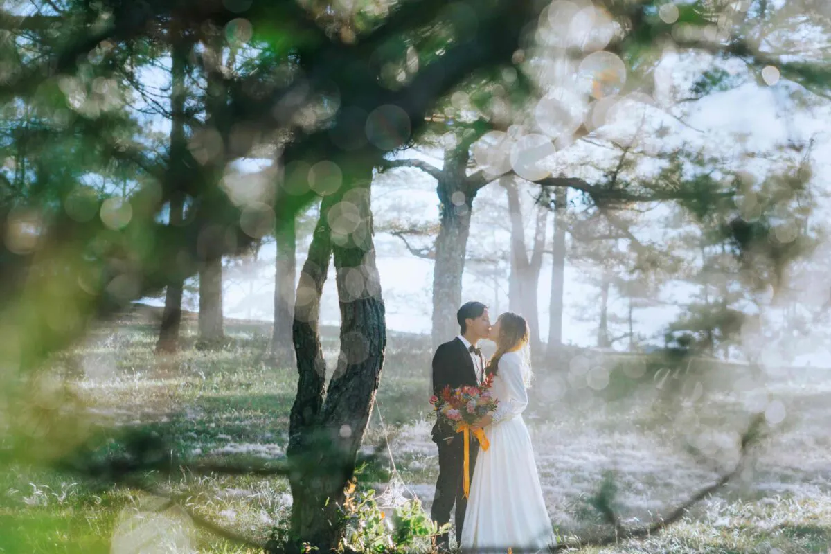 romantic couple at their wedding in the woods