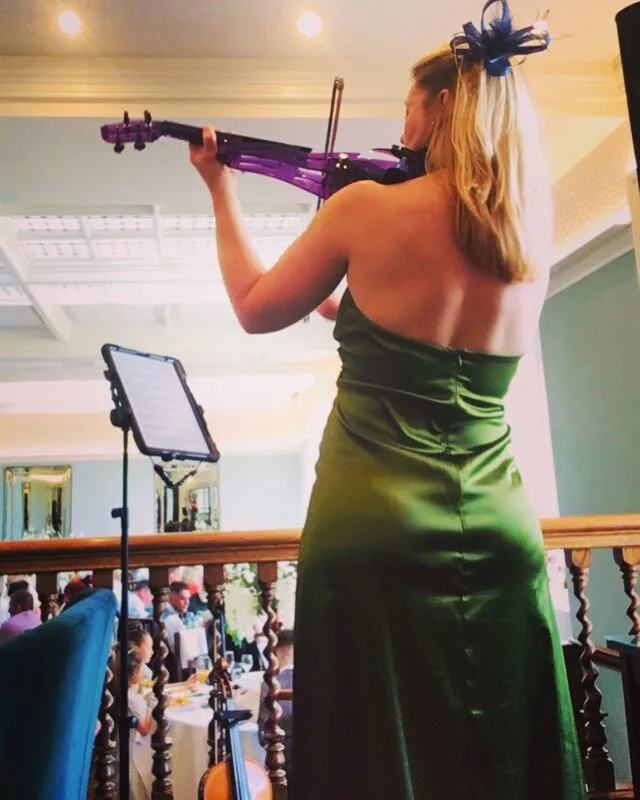 Electric violin green dress