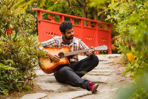 Live Singing and Playing Guitar