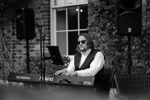 Singing and Instrumental Wedding Pianist
