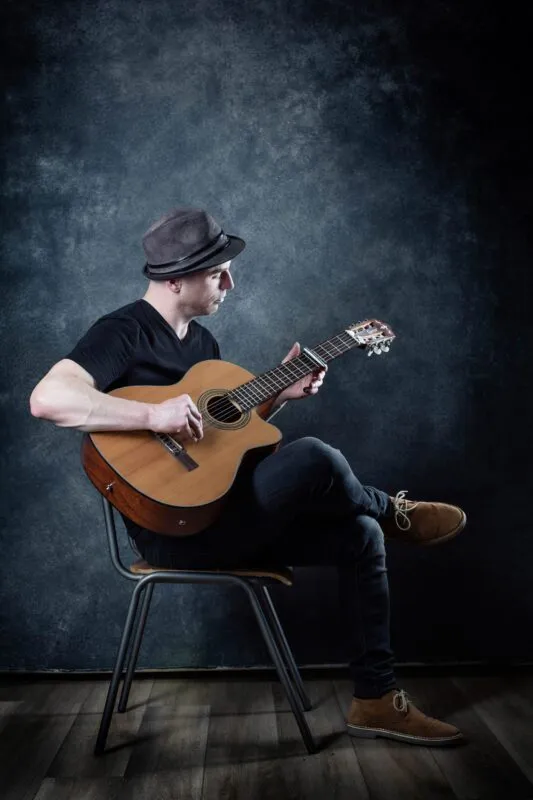 DGsatwithguitar (listing)