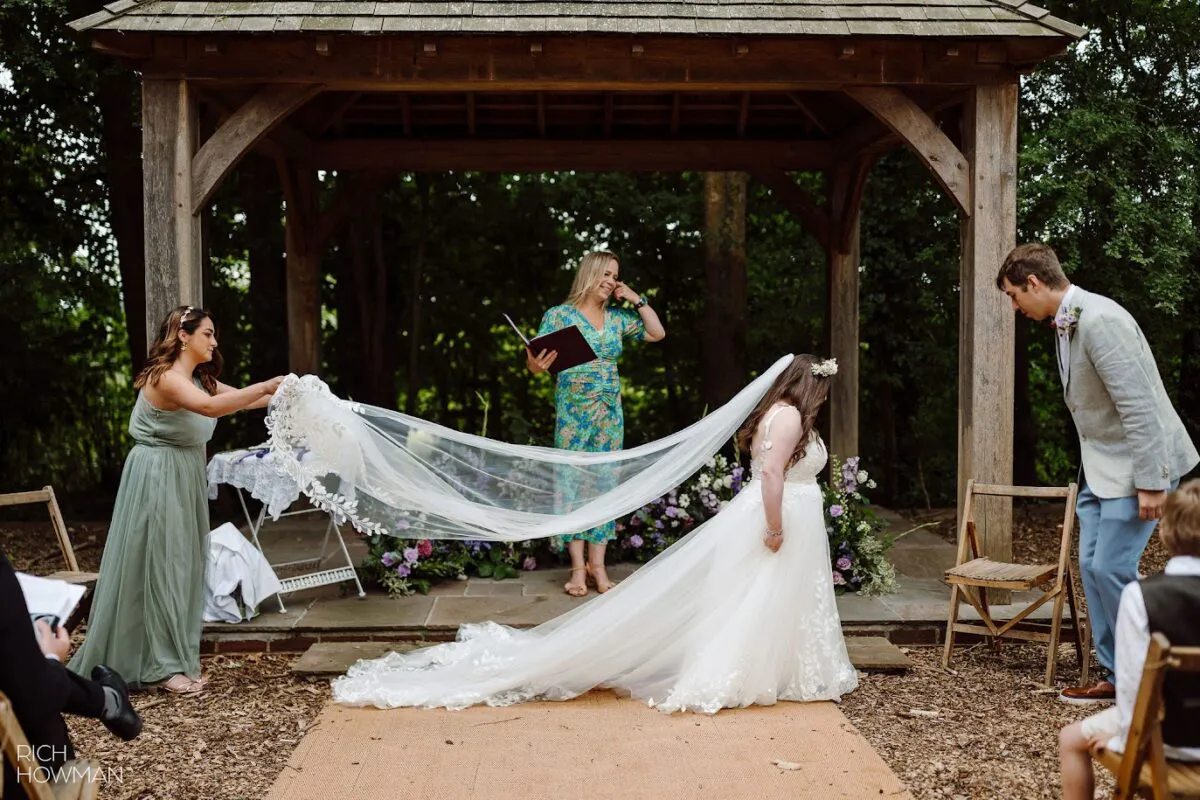 Zoe-and-Adam-arrival-gown