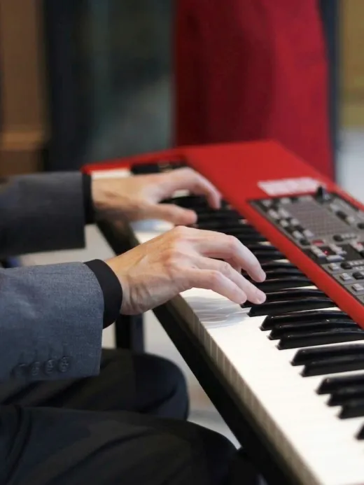 Hands at keyboard (listing)
